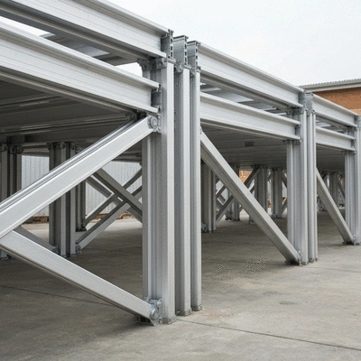 Detailed close-up of modular aluminum slab support components, showing panels, brackets, and connectors on a construction site