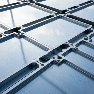 Close-up of aluminum formwork panels on a construction site